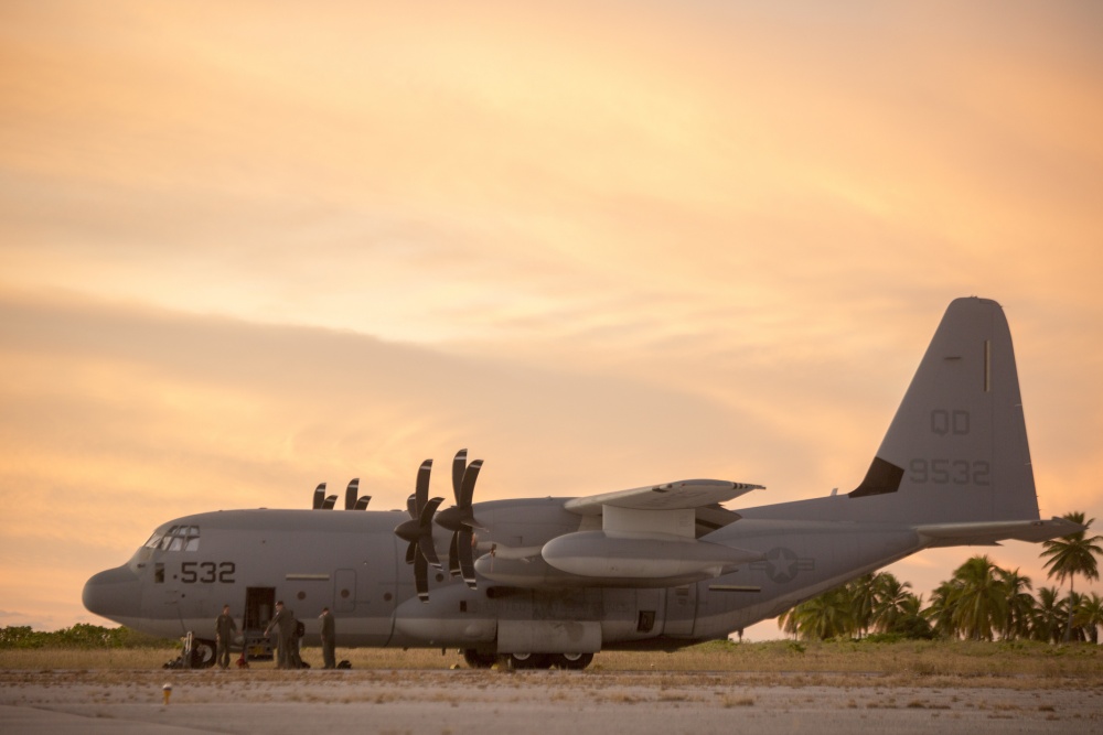 An aircraft sits on the runway